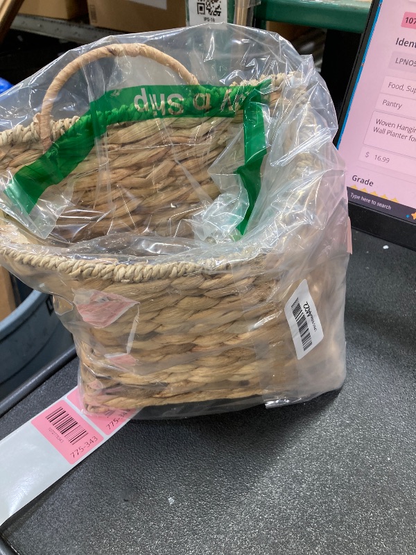 Photo 1 of ***DAMAGED -BENT INWARD -SELLING AS IS *** Woven Hanging Wall Basket Water Hyacinth Hanging Wall Basket Wicker Handmade Rattan Wall Planter for Garden Home Flowers Hanging Planters 8.6" D x 5.1" W x 11.6" H