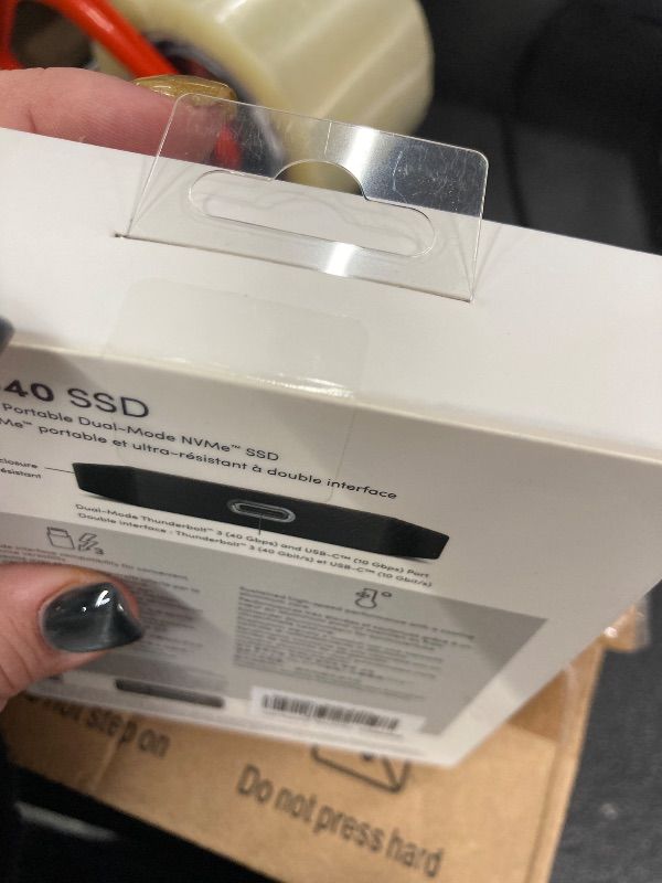 Photo 1 of ***Factory seal, NO RETURNS NO REFUNDS IF OPENED ***

SanDisk Professional 2TB PRO-G40 SSD - Up to 2700MB/s, Thunderbolt 3 (40Gbps), USB-C (10Gbps), IP68 dust/Water Resistance, External Solid State Drive - SDPS31H-002T-GBCND