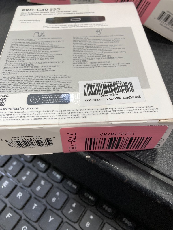 Photo 1 of ***Factory seal***
SanDisk Professional 2TB PRO-G40 SSD - Up to 2700MB/s, Thunderbolt 3 (40Gbps), USB-C (10Gbps), IP68 dust/Water Resistance, External Solid State Drive - SDPS31H-002T-GBCND