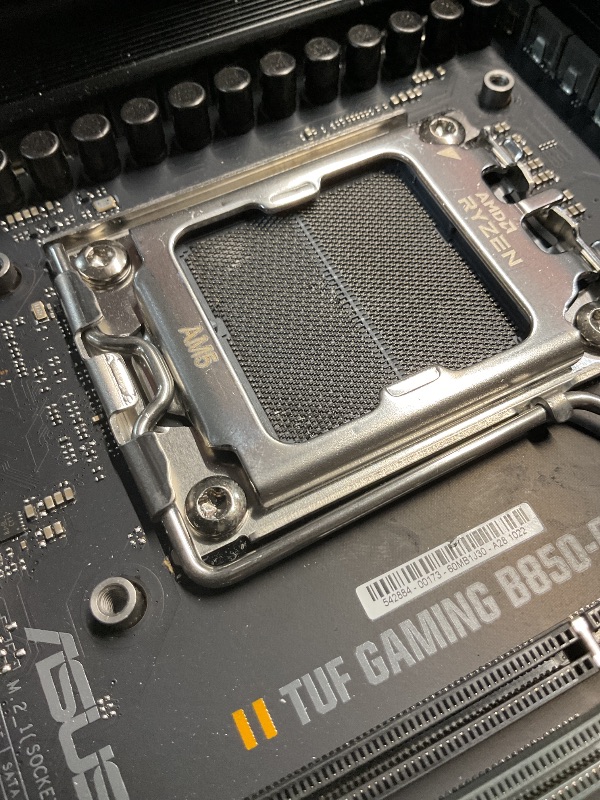 Photo 1 of **PINS BENT**ASUS TUF Gaming B850-PLUS WiFi AMD AM5 B850 ATX Motherboard, 14+2+1 80A Stages, AI Ready, DDR5, PCIe 5.0, 3X M.2, Wi-Fi 7, 2.5Gb LAN, DisplayPort, HDMI™, USB 10Gbps & 20Gbps Type-C®, BIOS Flashback™