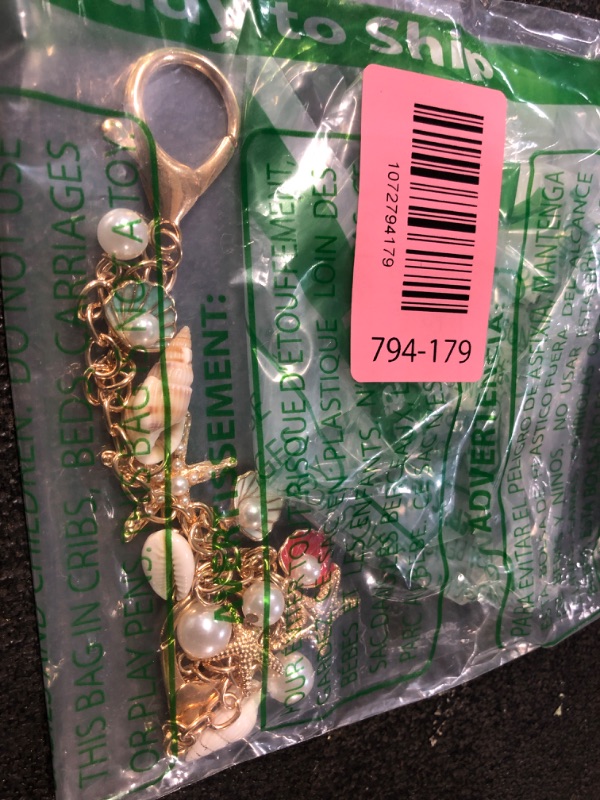 Photo 1 of ***STOCK PHOTO FOR REFERENCE ONLY*** Bohemian Starfish Shell Pearl Conch Charm Bracelet for Women Gold Chunky Cuban Link Chain Boho Mermaid Rhinestone Seashell Pendant Anklet Bracelets Summer Hawaiian Ocean Beach Holiday Trendy Jewelry