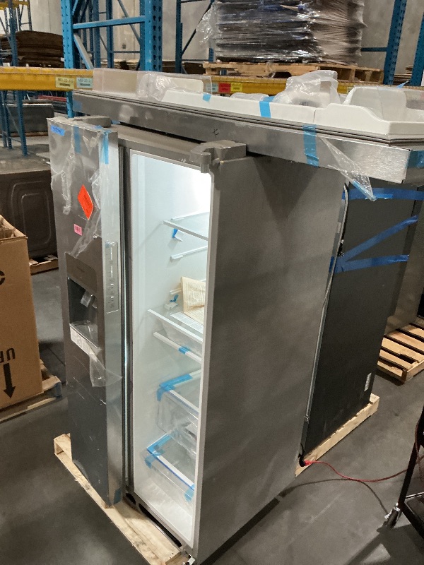 Photo 1 of ***MINOR DAMAGE****
***DAMAGED DURING TRANSIT - TRUCK/TRAILER PICKUP ONLY***Frigidaire 22.3-cu ft Standard-Depth 33-in Wide Side-by-Side Refrigerator with Ice Maker ,Water and Ice Dispenser ( Stainless Steel ) ENERGY STAR Certified