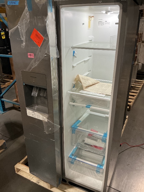 Photo 1 of ***MINOR DAMAGE****
***DAMAGED DURING TRANSIT - TRUCK/TRAILER PICKUP ONLY***Frigidaire 22.3-cu ft Standard-Depth 33-in Wide Side-by-Side Refrigerator with Ice Maker ,Water and Ice Dispenser ( Stainless Steel ) ENERGY STAR Certified
