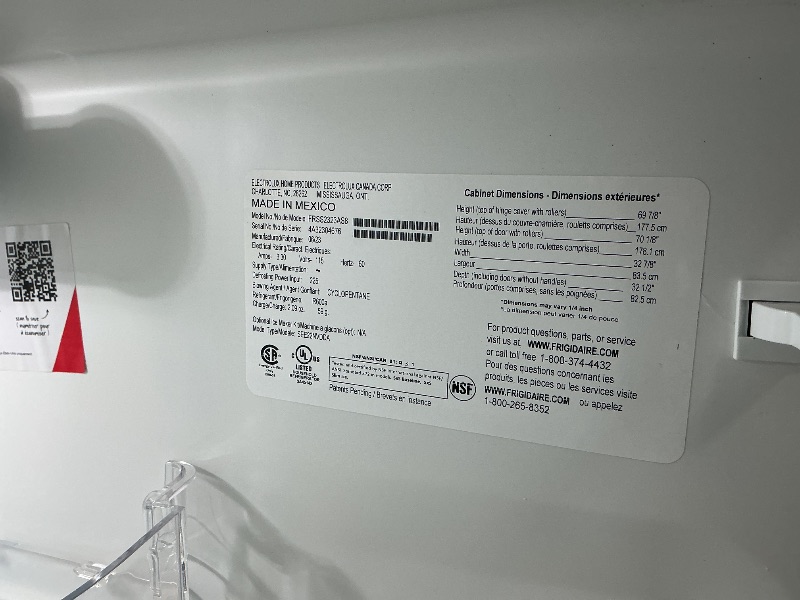 Photo 1 of ***MINOR DAMAGE****
***DAMAGED DURING TRANSIT - TRUCK/TRAILER PICKUP ONLY***Frigidaire 22.3-cu ft Standard-Depth 33-in Wide Side-by-Side Refrigerator with Ice Maker ,Water and Ice Dispenser ( Stainless Steel ) ENERGY STAR Certified