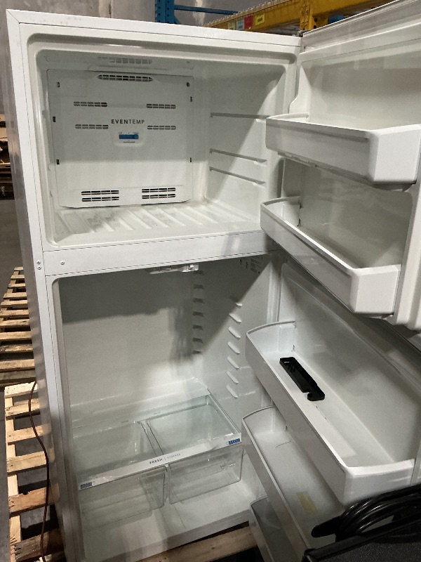 View 3 of ***DAMAGED DURING TRANSIT - TRUCK/TRAILER PICKUP ONLY***Frigidaire 18 Cu. Ft. Garage Ready Top Freezer Refrigerator
FFTR1835VW