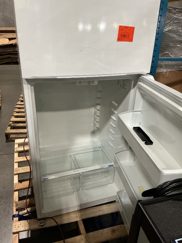 View 2 of ***DAMAGED DURING TRANSIT - TRUCK/TRAILER PICKUP ONLY***Frigidaire 18 Cu. Ft. Garage Ready Top Freezer Refrigerator
FFTR1835VW