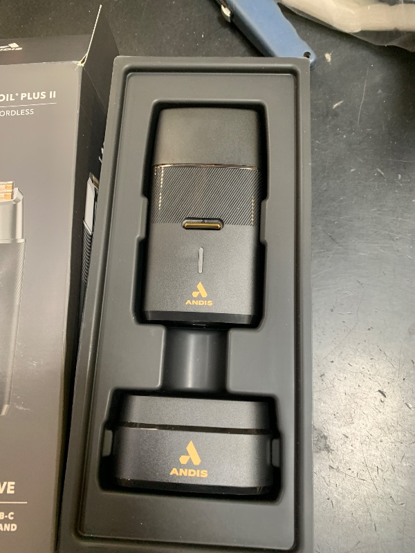 Photo 1 of Andis 563616 Pro Foil Plus II Cordless Shaver, Gold Titanium Foils, Lithium Ion Battery, Includes USB-C Charging Stand, Black