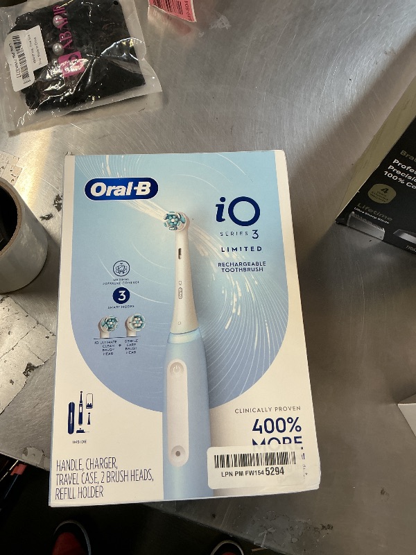 Photo 1 of Oral-B iO Deep Clean Rechargeable Electric Powered Toothbrush, Icy Blue with iO Series 3 Limited, 2 Brush Heads and Travel Case - Pressure Sensor to Protect Gums - 3 Cleaning Settings - 2 Minute Timer