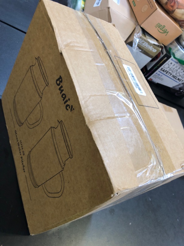 Photo 1 of **INOMPLETE, DAMAGED** Buaic Glass Pitcher with Lid, 68 oz/ 2 Liter Classic Vertical Stripes Water Pitcher with Handle,Glass Water Carafe for Cold Brew, Coffee, Lemonade, Iced Sun Tea,Beverage,Heat Resistant