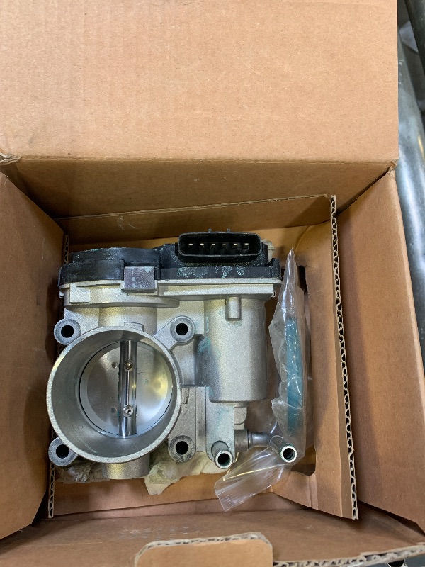 Photo 1 of Dorman 977-239 Electronic Throttle Body Compatible with Select Nissan Models (OE FIX)