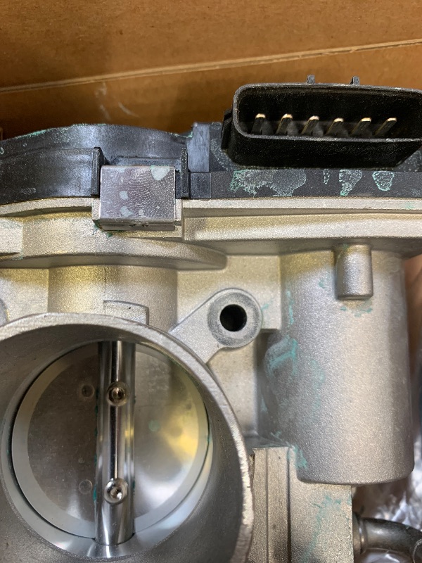 Photo 1 of Dorman 977-239 Electronic Throttle Body Compatible with Select Nissan Models (OE FIX)