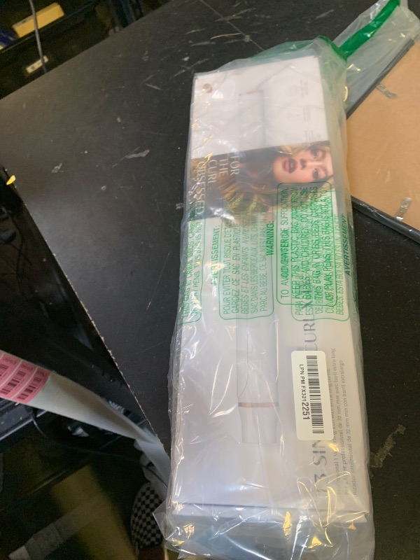 Photo 1 of T3 SinglePass Curl X Extra-Long Barrel Curling Iron with 9 Heat Settings and Ceramic Barrel for Fast Styling and Lasting Results on All Hair Types