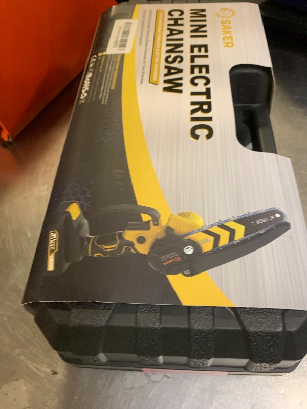 Photo 1 of **USED, SEE NOTES** Saker Mini Chainsaw,6 Inch Portable Electric Chainsaw Cordless, Small Handheld Chain saw for Tree Branches,Courtyard, Household and Garden (SK1806D-Y)