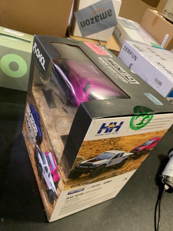 Photo 1 of Axial RC Truck 1/24 SCX24 Base Camp 4x4 Rock Crawler Brushed RTR (Everything Needed to Run is Included) - Pink, AXI-1219T3