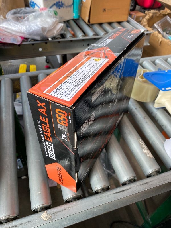 Photo 1 of [DAMAGED PINS] GIGABYTE B650 Eagle AX AM5 LGA 1718 AMD B650 ATX Motherboard, DDR5, Triple M.2 (1x PCIe 5.0 M.2 + 2X PCIe 4.0 M.2), USB 3.2 Gen2x2 Type-C, AMD Wi-Fi 6E, Realtek GbE LAN