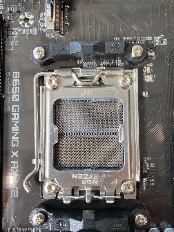 Photo 1 of [DAMAGED PINS] GIGABYTE B650 Eagle AX AM5 LGA 1718 AMD B650 ATX Motherboard, DDR5, Triple M.2 (1x PCIe 5.0 M.2 + 2X PCIe 4.0 M.2), USB 3.2 Gen2x2 Type-C, AMD Wi-Fi 6E, Realtek GbE LAN