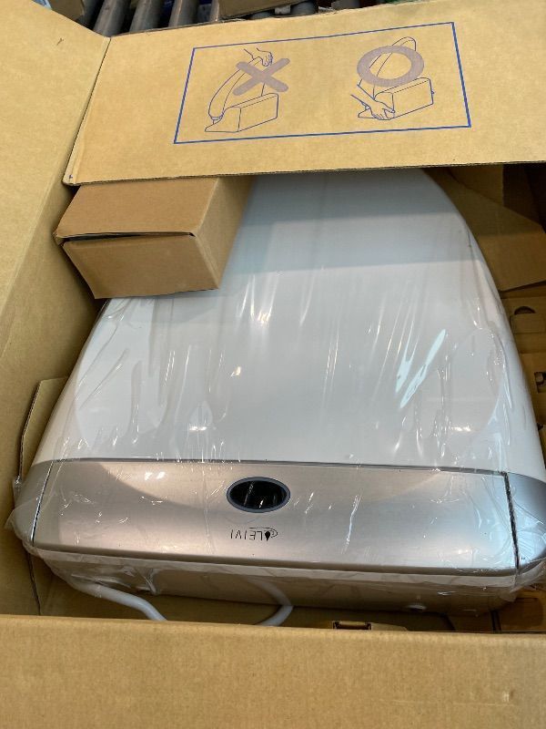 Photo 1 of *UNTESTED*
LEIVI Electric Bidet Toilet Seat with Wireless Remote and Side Panel, Multiple Spray Modes, Adjustable Heated Seat, Warm Water and Air Dryer, Auto LED Nightlight, Elongated