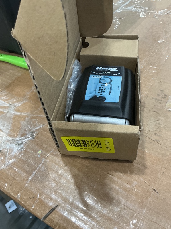 Photo 1 of **UNTESTED**
Master Lock Black Outdoor Key Lock Box with Push Buttons to Hide a Key, Easily Set, Share, and Change Combination for Tenants, Guests, Clients, Move Between Listings, 5422E