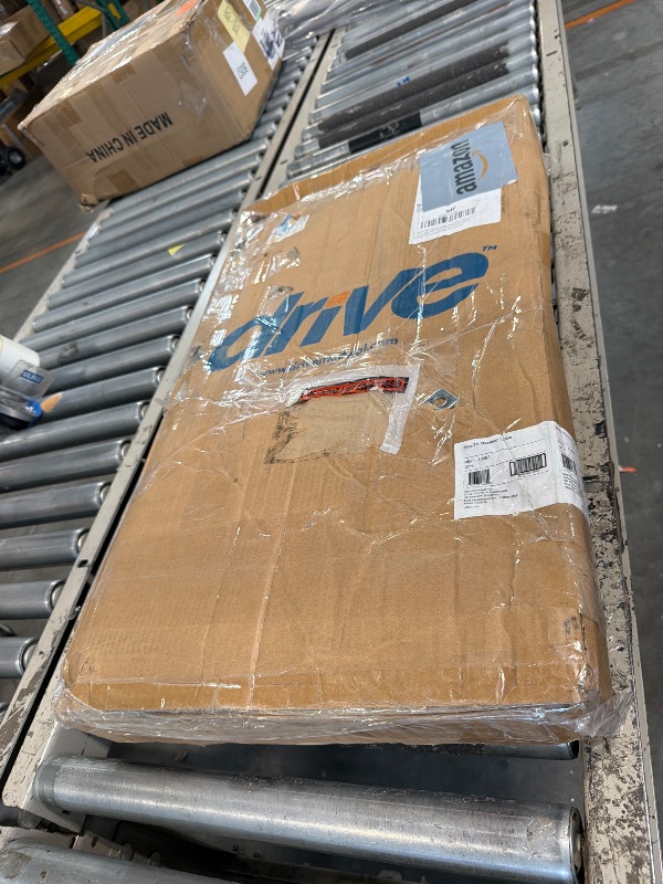 Photo 1 of ** MISSING HARDWARE ****Drive Medical Overbed Table with Wheels - Secure Height Adjustment for Comfort - Non Tilt Surface - Smooth Rolling Design - Home & Hospital Use - Woodgrain Laminate Top - Silver Vein