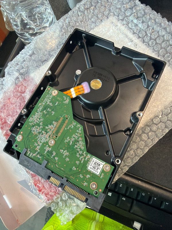 Photo 1 of **UNTESTED**
Western Digital 4TB WD Red Plus NAS Internal Hard Drive HDD - 5400 RPM, SATA 6 Gb/s, CMR, 128 MB Cache, 3.5" - WD40EFZZ