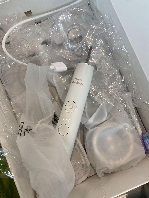 Photo 1 of **White - See Clerk Photos**
Philips Sonicare DiamondClean 9900 Prestige Electric Toothbrush - with SenseIQ Technology and Advanced AI App, 5 Brushing Modes, 3 Intensity Levels, Charging Travel Case, Quartz Black, Model BD7001AZ