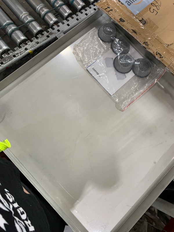 Photo 1 of *** no accessories** GarveeTech 24 in x 24 in Washing Machine Pan for Washer and Dryer and Small Appliances, 304 Stainless Steel Washing Machine Tray with 4 Pcs Anti-Vibration Washing Machine Feet, No Hole