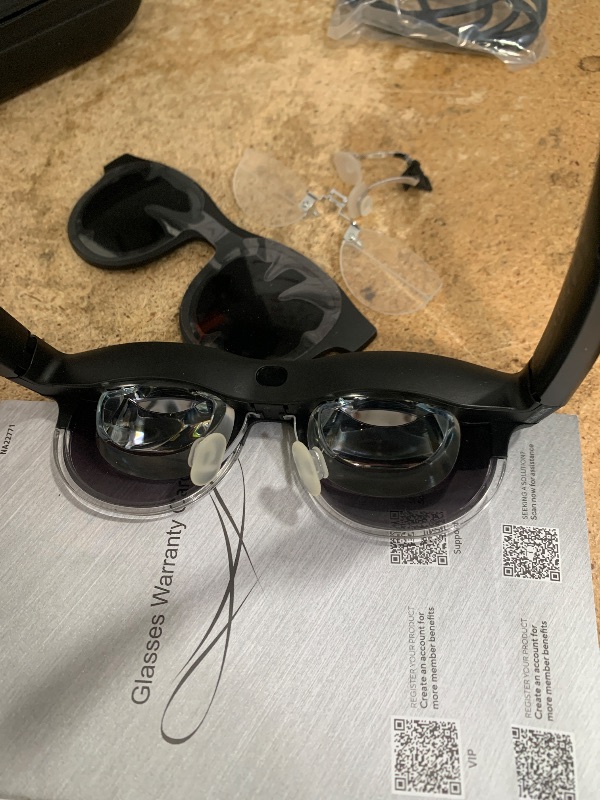 Photo 1 of ***RIGHT SIDE IS BLURRY***
ASUS AirVision M1 Smart AR Glasses - 100" Micro-OLED Wearable Display, 1100 nits, Multi-Screen, Speakers, USB-C, Magnetic Shade, Designed for ROG Ally/Steam Deck/PC/iPhone 16/15/Android/Mac/Tablet