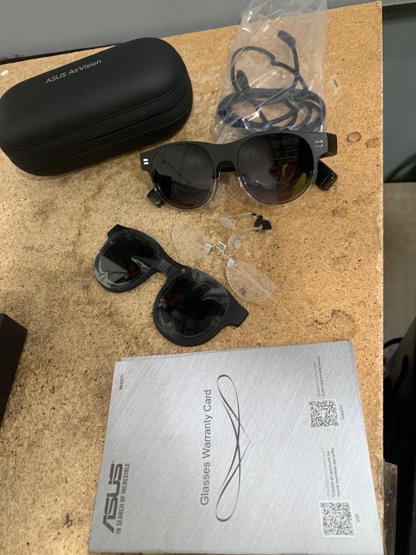 Photo 1 of ***RIGHT SIDE IS BLURRY***
ASUS AirVision M1 Smart AR Glasses - 100" Micro-OLED Wearable Display, 1100 nits, Multi-Screen, Speakers, USB-C, Magnetic Shade, Designed for ROG Ally/Steam Deck/PC/iPhone 16/15/Android/Mac/Tablet