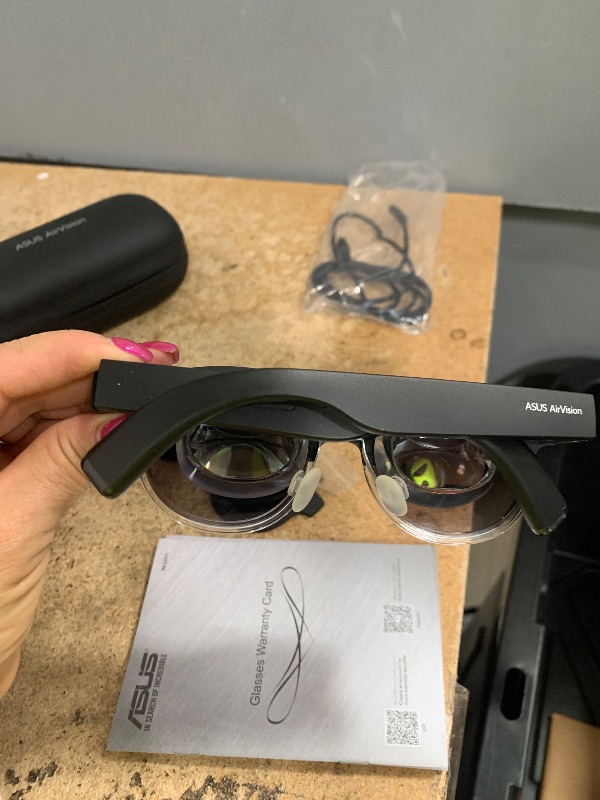 Photo 1 of ***RIGHT SIDE IS BLURRY***
ASUS AirVision M1 Smart AR Glasses - 100" Micro-OLED Wearable Display, 1100 nits, Multi-Screen, Speakers, USB-C, Magnetic Shade, Designed for ROG Ally/Steam Deck/PC/iPhone 16/15/Android/Mac/Tablet