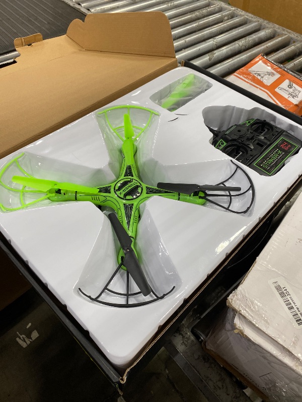 View 3 of **UPDATED PHOTOS**Striker-X Glow in the Dark HD Camera Drone – 2.4GHz 4.5CH RC Quadcopter with 720p Picture & Video Camera – 4GB Memory Card Included – Altitude Lock, Flip Stunt Mode, Hover Mode – Drone for Ages 14+
