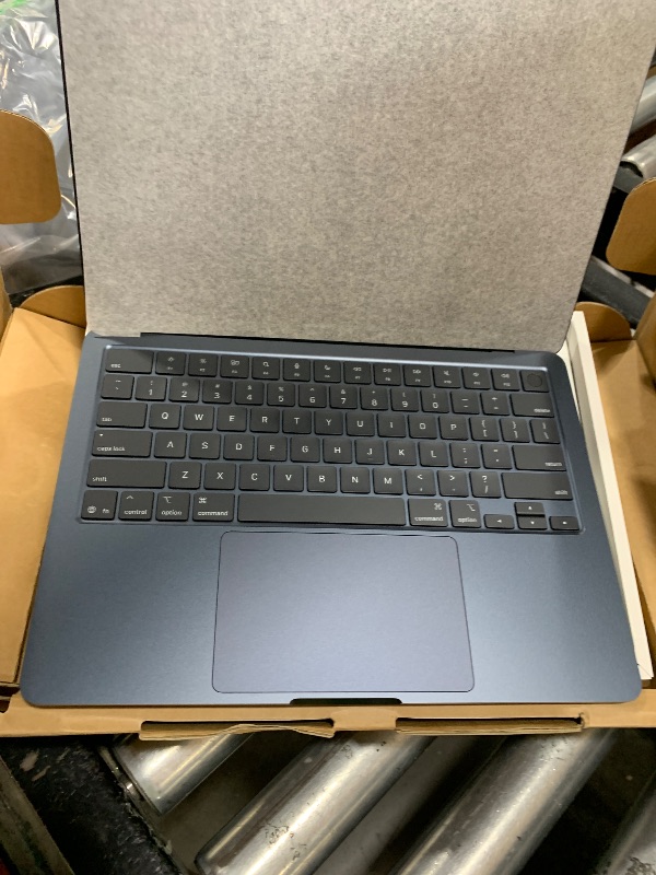 Photo 1 of Apple 2025 MacBook Air 13-inch Laptop with M4 chip: Built for Apple Intelligence, 13.6-inch Liquid Retina Display, 16GB Unified Memory, 256GB SSD Storage, 12MP Center Stage Camera, Touch ID; Midnight
