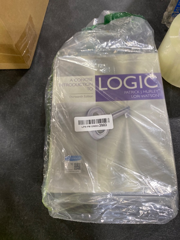 Photo 1 of A Concise Introduction to Logic (MindTap Course List)