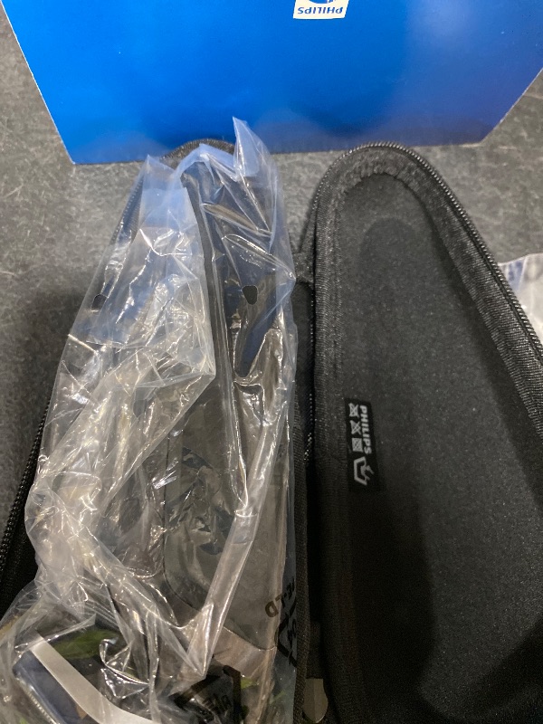 Photo 1 of Philips Norelco Shaver 7600, Rechargeable Wet & Dry Electric Shaver with SenseIQ Technology, Quick Clean Pod, Travel Case & Pop-up Trimmer, S7886/84