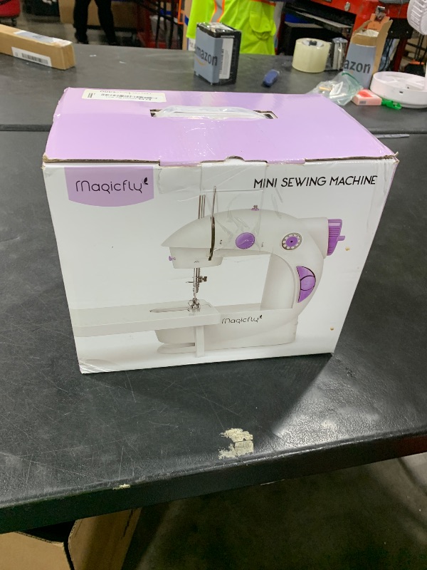 Photo 1 of Magicfly Mini Sewing Machine with Extension Table, Dual Speed Portable Sewing Machine for Beginners with Light, Sewing Kit for Household Use, White