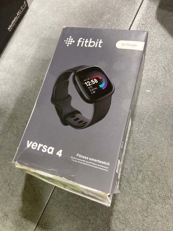 Photo 1 of Fitbit Versa 4 Fitness Smartwatch with Daily Readiness, GPS, 24/7 Heart Rate, 40+ Exercise Modes, Sleep Tracking and more, Black/Graphite, One Size (S & L Bands Included)