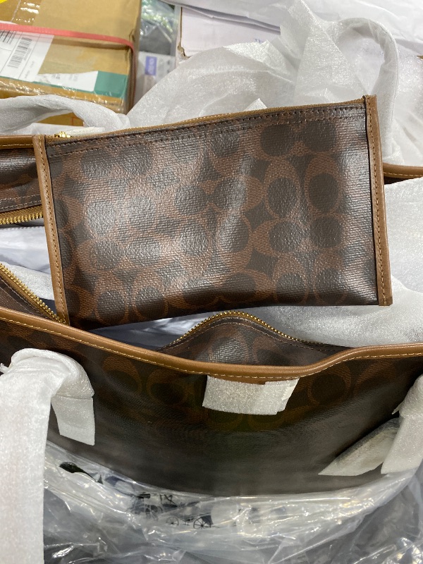 Photo 1 of Coach Women's Taxi Tote Bag In Signature Canvas Maple Sable One Size