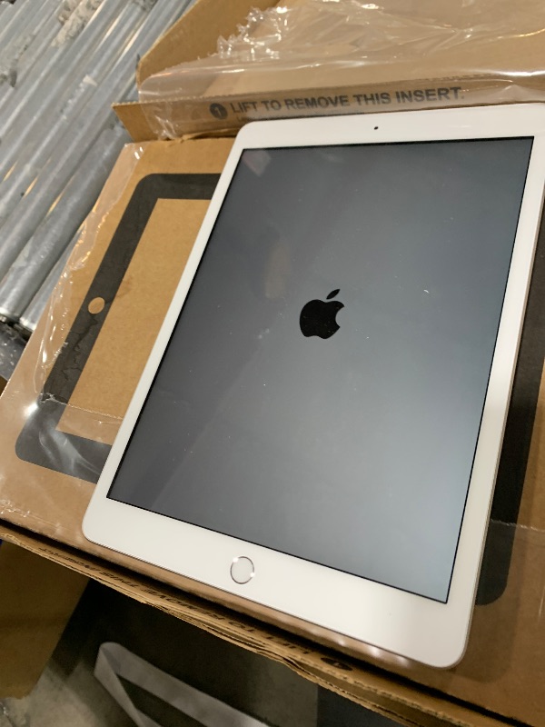 Photo 1 of Apple iPad (10.2-inch, Wi-Fi, 32GB) - Silver (Latest Model, 8th Generation) (Renewed)