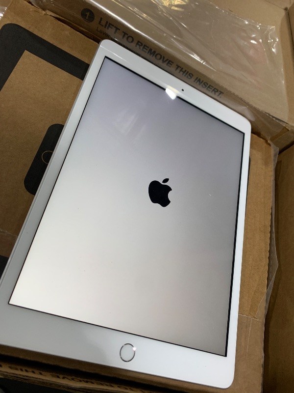 Photo 1 of Apple iPad (10.2-inch, Wi-Fi, 32GB) - Silver (Latest Model, 8th Generation) (Renewed)