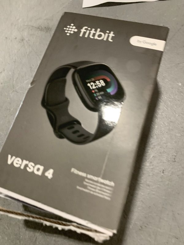 Photo 1 of Fitbit Versa 4 Fitness Smartwatch with Daily Readiness, GPS, 24/7 Heart Rate, 40+ Exercise Modes, Sleep Tracking and more, Black/Graphite, One Size (S & L Bands Included)