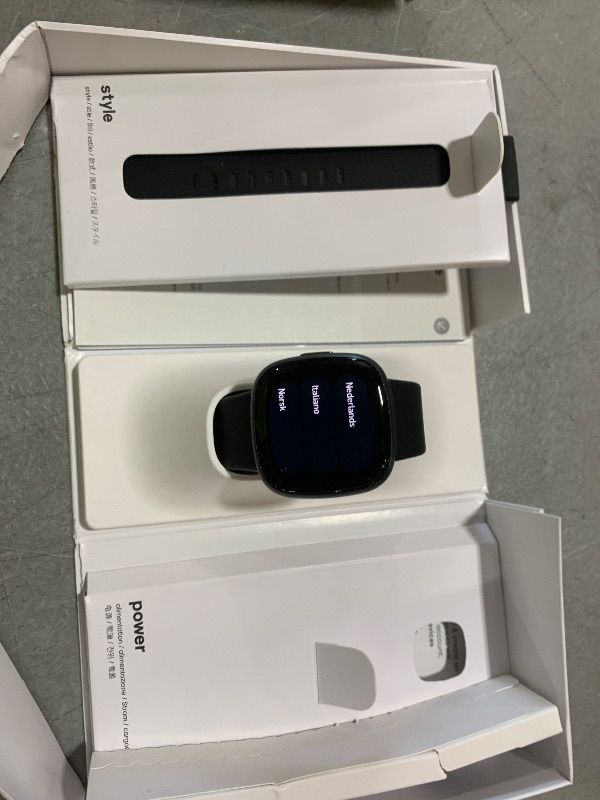 Photo 1 of Fitbit Versa 4 Fitness Smartwatch with Daily Readiness, GPS, 24/7 Heart Rate, 40+ Exercise Modes, Sleep Tracking and more, Black/Graphite, One Size (S & L Bands Included)