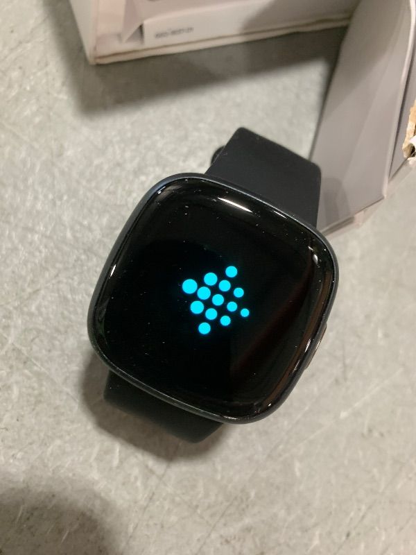 Photo 1 of Fitbit Versa 4 Fitness Smartwatch with Daily Readiness, GPS, 24/7 Heart Rate, 40+ Exercise Modes, Sleep Tracking and more, Black/Graphite, One Size (S & L Bands Included)