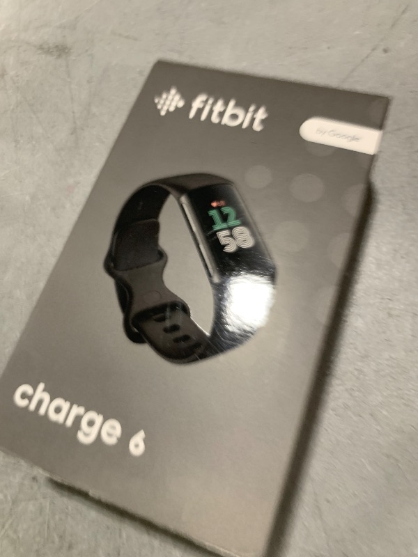 Photo 1 of Fitbit Charge 6 Fitness Tracker with Google apps, Heart Rate on Exercise Equipment, 6-Months Premium Membership Included, GPS, Health Tools and More, Obsidian/Black, One Size (S & L Bands Included)