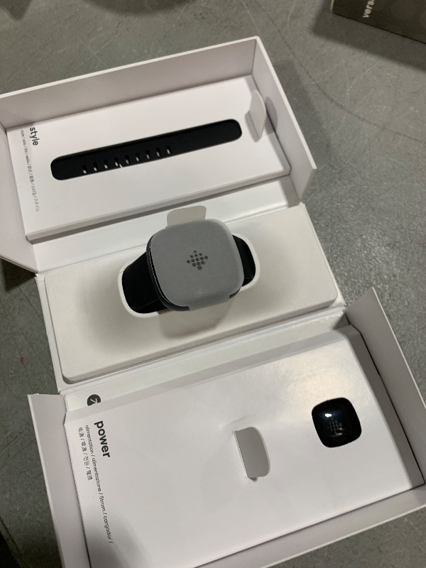 Photo 1 of Fitbit Versa 4 Fitness Smartwatch with Daily Readiness, GPS, 24/7 Heart Rate, 40+ Exercise Modes, Sleep Tracking and more, Black/Graphite, One Size (S & L Bands Included)