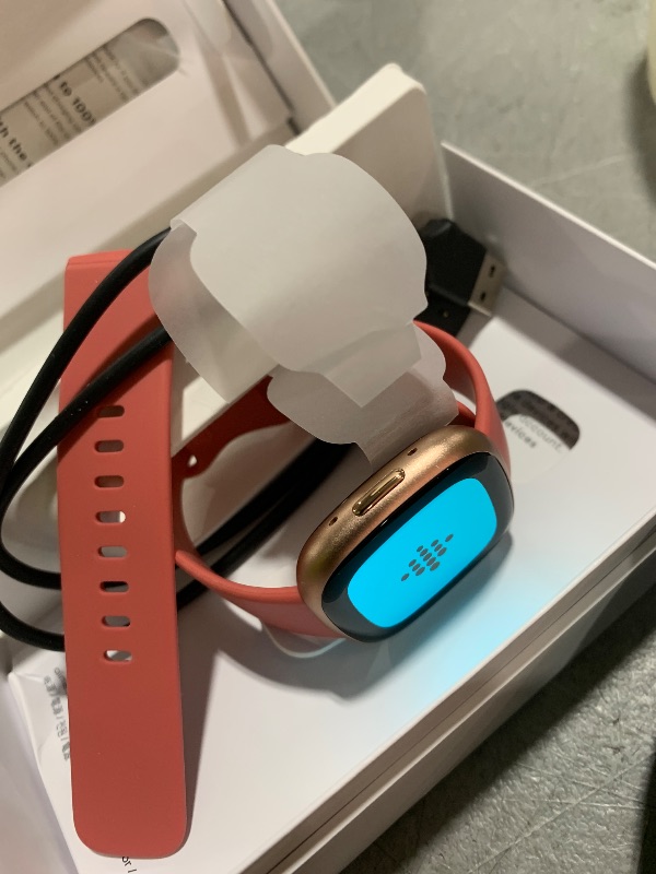 Photo 1 of Fitbit Versa 4 Fitness Smartwatch with Daily Readiness, GPS, 24/7 Heart Rate, 40+ Exercise Modes, Sleep Tracking and more, Pink Sand/Copper Rose, One Size (S & L Bands Included)