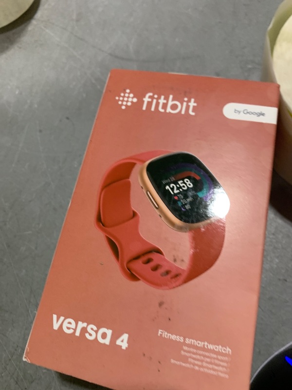 Photo 1 of Fitbit Versa 4 Fitness Smartwatch with Daily Readiness, GPS, 24/7 Heart Rate, 40+ Exercise Modes, Sleep Tracking and more, Pink Sand/Copper Rose, One Size (S & L Bands Included)