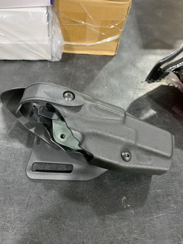 Photo 1 of Safariland 6360 Level 3 Retention ALS Duty Mid Ride Holster for 2-Inch Belt, Black, Right Hand, Glock 22