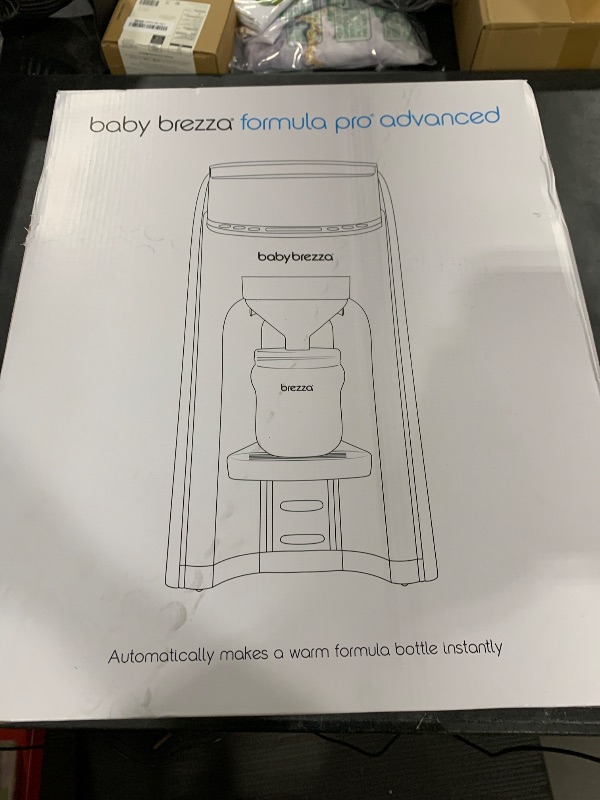 Photo 1 of Baby Brezza Formula Pro Advanced Formula Dispenser Machine - Automatically Mix a Warm Formula Bottle Instantly - Easily Make Bottle with Automatic Powder Blending, Charcoal
