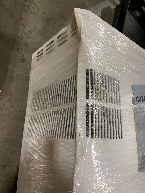 Photo 1 of DOES NOT FUNCTION** FOR PARTS*******LG 23,000 BTU 230V Window-Mounted Air Conditioner with 9,200/11,200 BTU Supplemental Heat Function