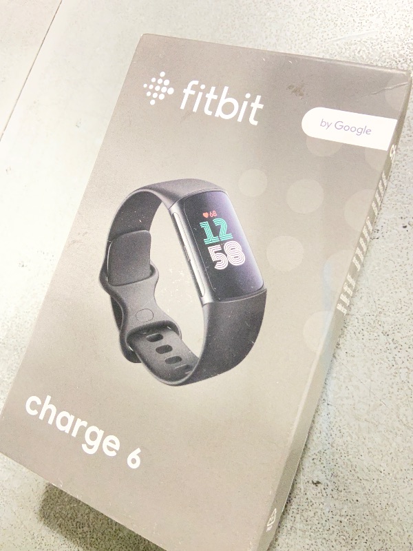Photo 1 of Fitbit Charge 6 Fitness Tracker with Google apps, Heart Rate on Exercise Equipment, 6-Months Premium Membership Included, GPS, Health Tools and More, Obsidian/Black, One Size (S & L Bands Included)
