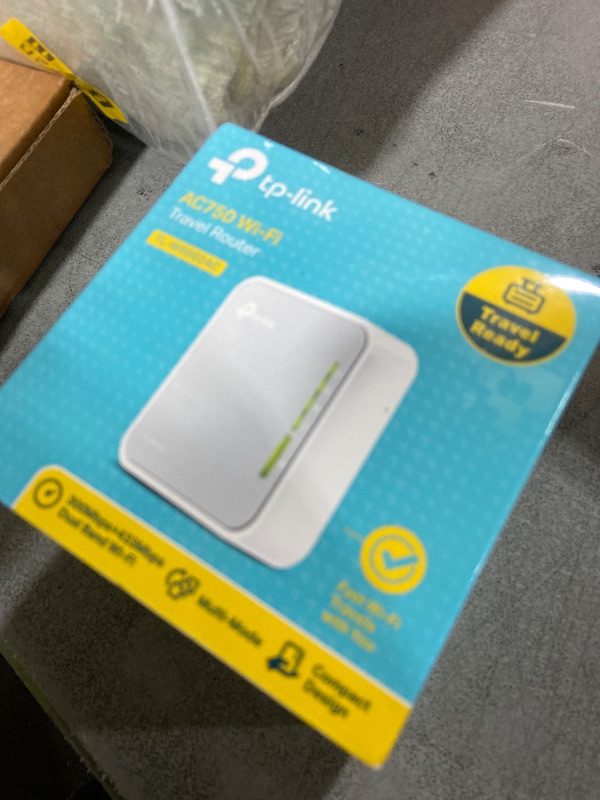 Photo 1 of TP-Link AC750 Wireless Portable Nano Travel Router(TL-WR902AC) - Support Multiple Modes, WiFi Router/Hotspot/Bridge/Range Extender/Access Point/Client Modes, Dual Band WiFi, 1 USB 2.0 Port